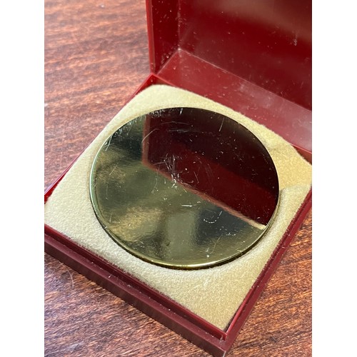 246 - Gold coloured medal blank no inscription, with box,