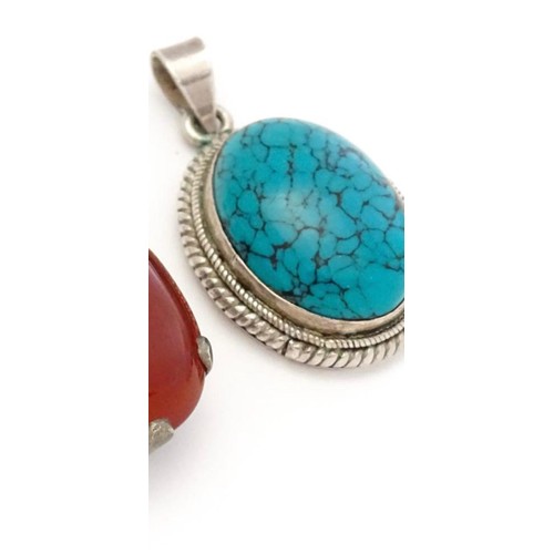 275 - Silver pendant with Turquoise center stone