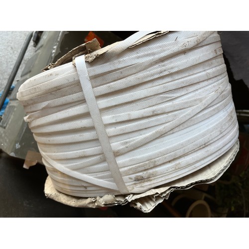 179 - Large roll of white strapping/ banding