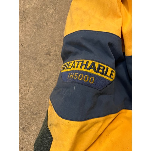 218 - XM Breathable sailing waterproof suit. Choice of sizes S & M available. TH5000 in yellow and navy bl... 