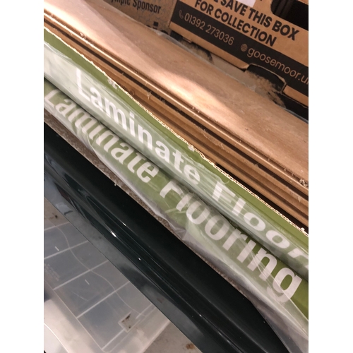 440 - 14 lengths of laminate Oak effect flooring.