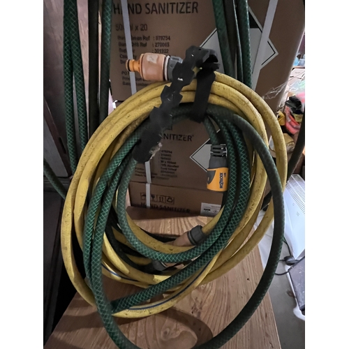 446 - 2 Hosepipes with fittings