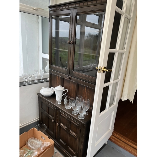 484 - Pair of glazed cabinets with drawers under