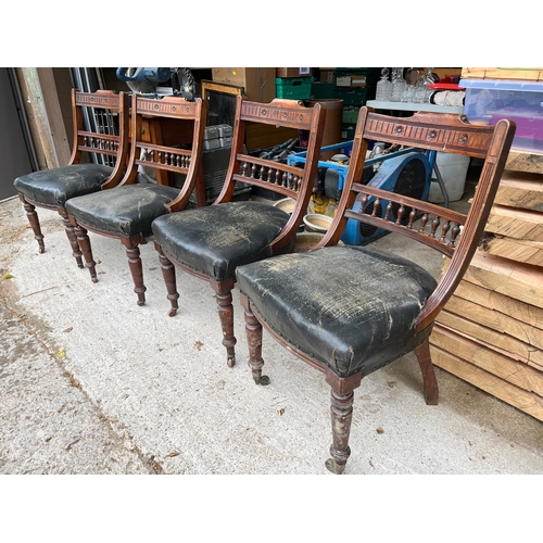 535 - Set of 4 rare Georgian carved chairs with front wheels and spring seats covered with leather.