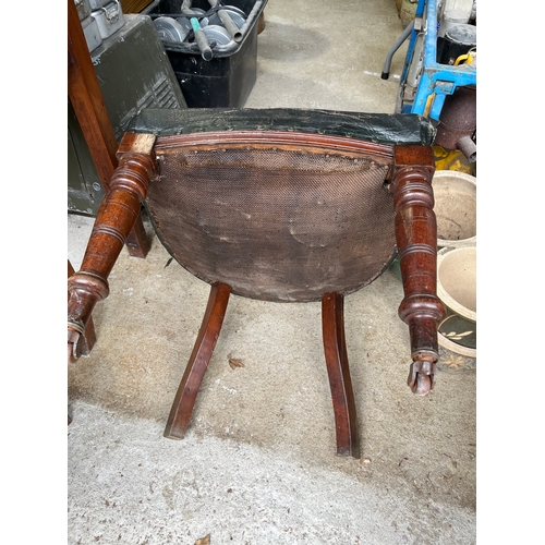 535 - Set of 4 rare Georgian carved chairs with front wheels and spring seats covered with leather.