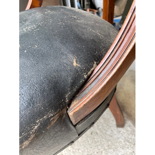 535 - Set of 4 rare Georgian carved chairs with front wheels and spring seats covered with leather.