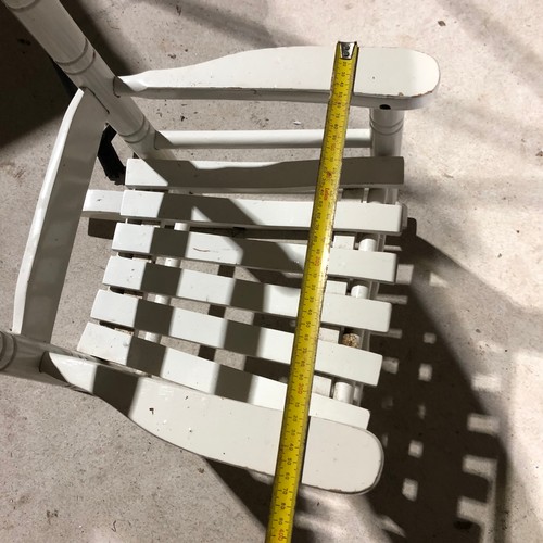 553 - Childs wooden rocking chair painted white.