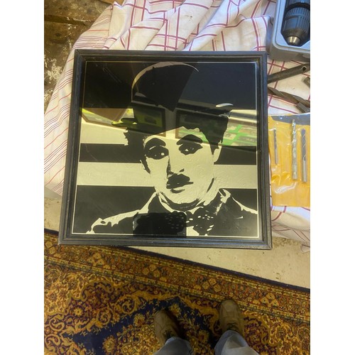 690 - Charley Chaplin picture mirror, framed