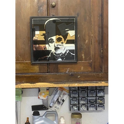 690 - Charley Chaplin picture mirror, framed