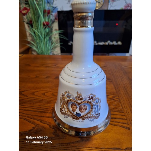 726 - Bell's Scotch Whisky. Full & sealed 75cl 40% ceramic Charles & Diana Royal wedding commemorative dec... 