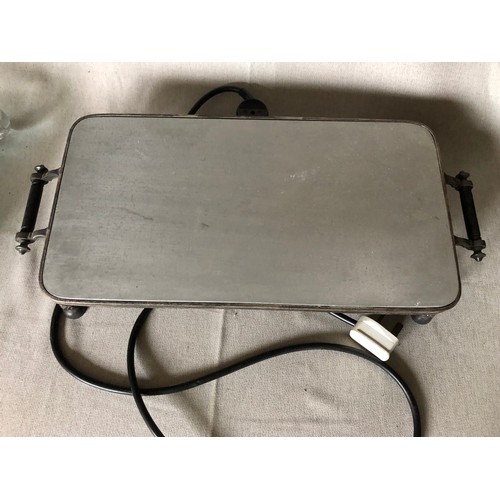 765 - Silver plated electric hot plate with aluminium surface and bakelite handles and feet