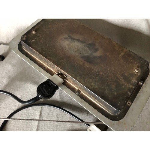 765 - Silver plated electric hot plate with aluminium surface and bakelite handles and feet