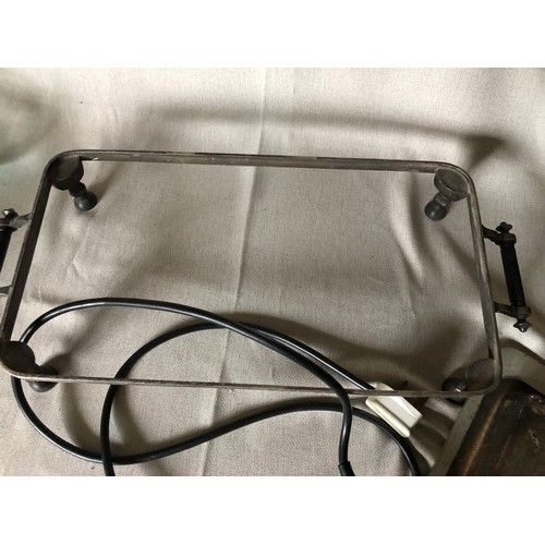 765 - Silver plated electric hot plate with aluminium surface and bakelite handles and feet