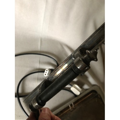 765 - Silver plated electric hot plate with aluminium surface and bakelite handles and feet