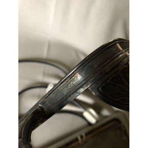 765 - Silver plated electric hot plate with aluminium surface and bakelite handles and feet