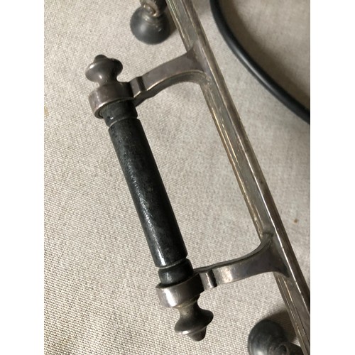 765 - Silver plated electric hot plate with aluminium surface and bakelite handles and feet