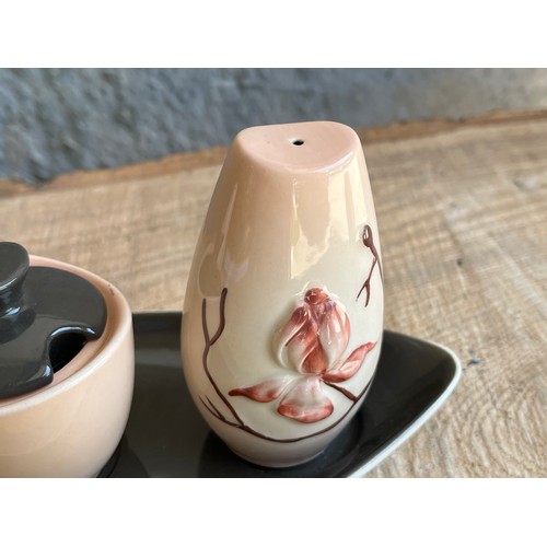 945 - Carltonware Austrian pattern cruet set.