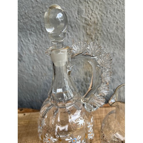 969 - 2 Moser glass items. Decanter and jug with applied enamel paint decoration