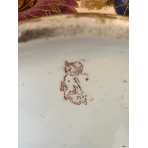 1013 - Antique hand painted ceramic moon vase with gilded handles decorated with buttery and flowers