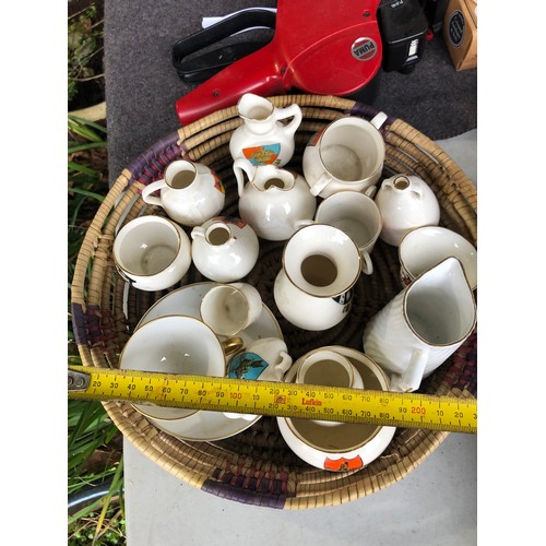 1060 - Basket of antique Goss posy vases etc.
