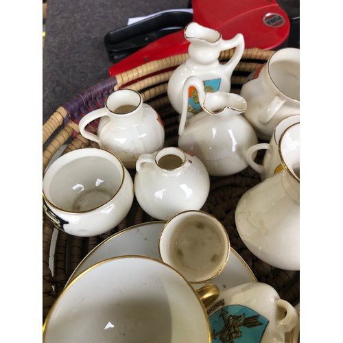 1060 - Basket of antique Goss posy vases etc.