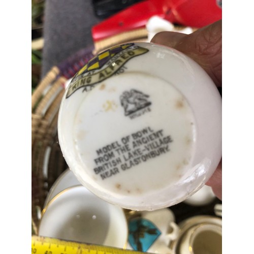 1060 - Basket of antique Goss posy vases etc.