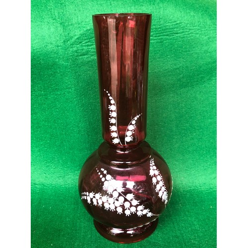 1113 - Cranberry glass vase decorated in lily-of-the-valley white enamel.