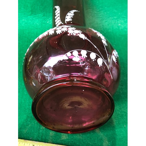 1113 - Cranberry glass vase decorated in lily-of-the-valley white enamel.