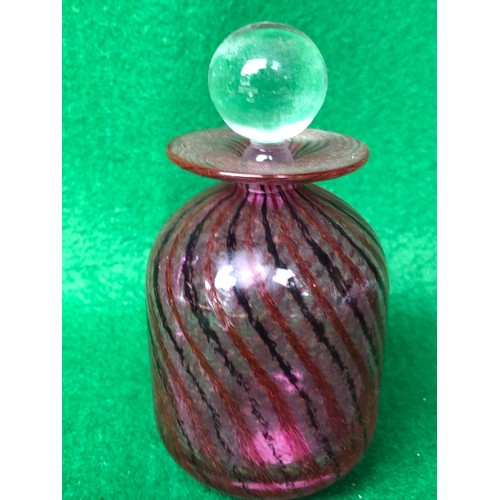 1123 - A pretty Isle of Wight signed Chris Lucus coloured glass perfume bottle.