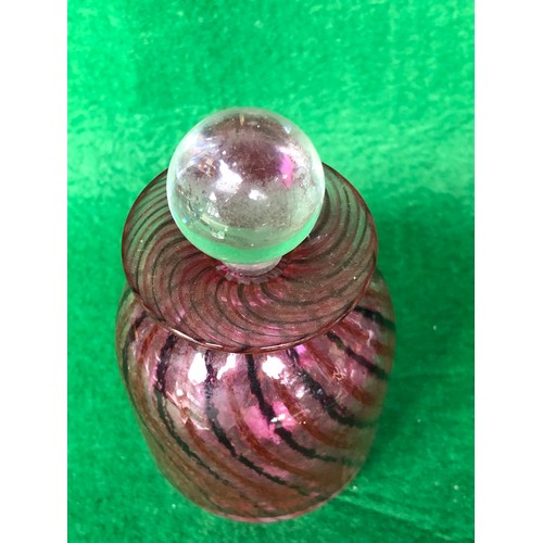 1123 - A pretty Isle of Wight signed Chris Lucus coloured glass perfume bottle.