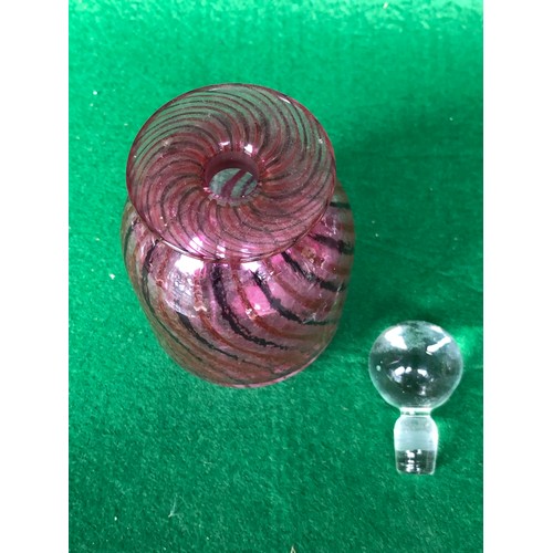 1123 - A pretty Isle of Wight signed Chris Lucus coloured glass perfume bottle.