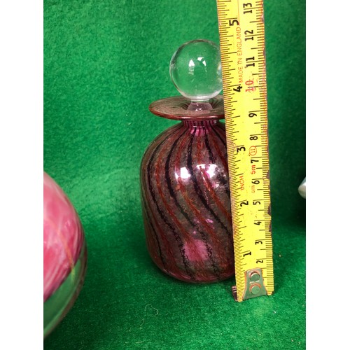 1123 - A pretty Isle of Wight signed Chris Lucus coloured glass perfume bottle.