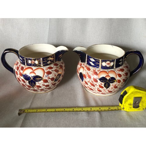 1150 - Pair of large Crown Derby Imari jugs in pattern No.1015