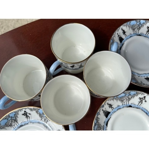 1166 - Part set of Paragon Silhouette with blue handles and details.