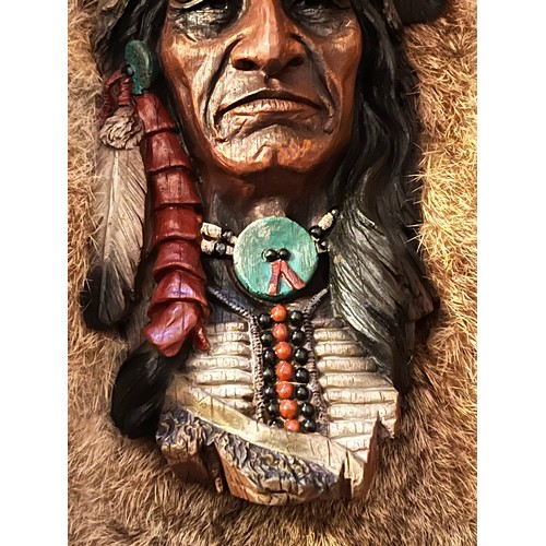 1305 - Resin bust of a Red Indian chief set in rabbit fur framed and glazed