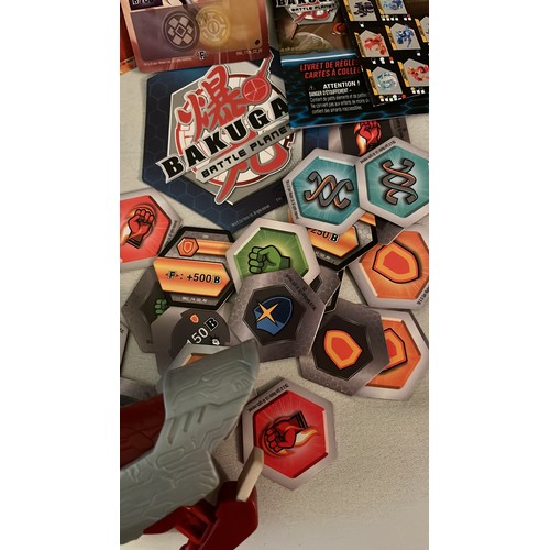 1376 - A large collection of Bakugan toys and cards. Very collectable