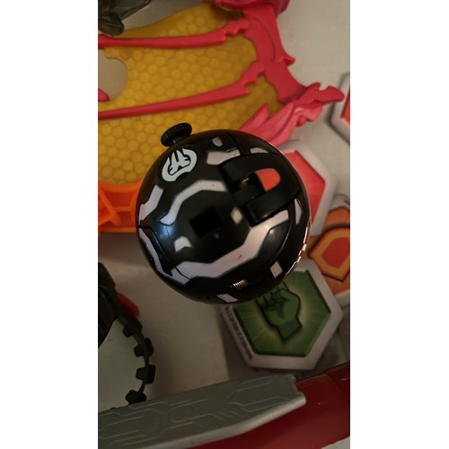 1376 - A large collection of Bakugan toys and cards. Very collectable