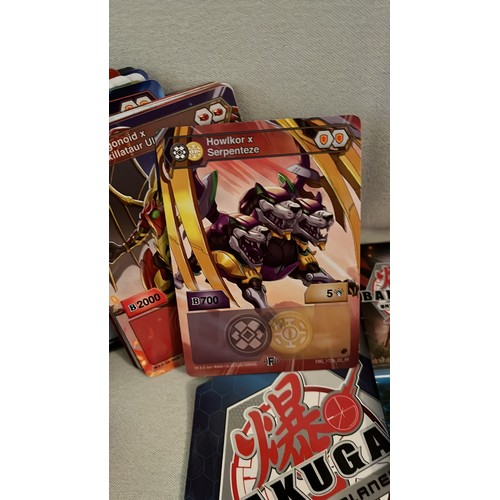 1376 - A large collection of Bakugan toys and cards. Very collectable