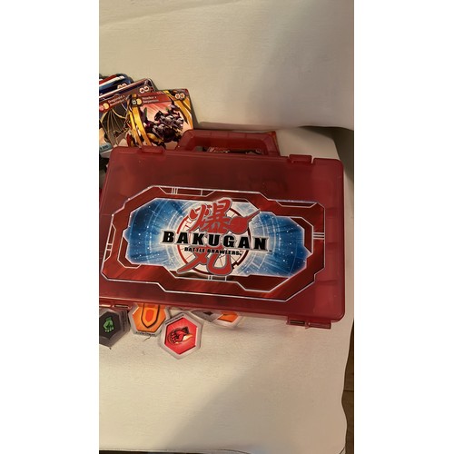 1376 - A large collection of Bakugan toys and cards. Very collectable