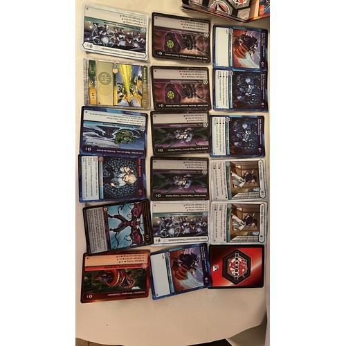 1376 - A large collection of Bakugan toys and cards. Very collectable