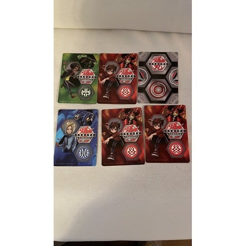 1376 - A large collection of Bakugan toys and cards. Very collectable