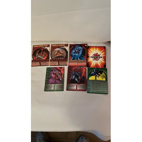 1376 - A large collection of Bakugan toys and cards. Very collectable