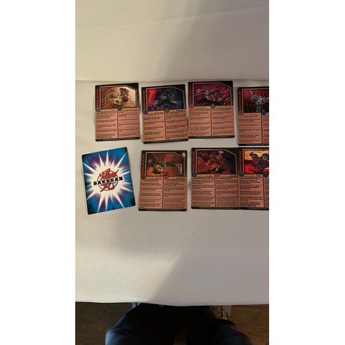 1376 - A large collection of Bakugan toys and cards. Very collectable