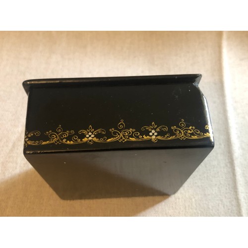 1414 - A beautiful Palekh Russian lacquered painted cigarette box with warrior riding a horse in full armou... 