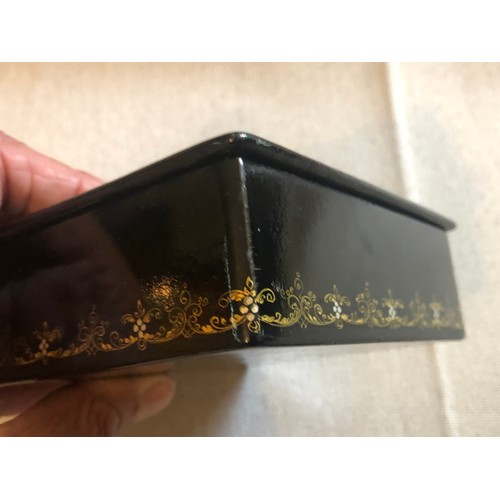 1414 - A beautiful Palekh Russian lacquered painted cigarette box with warrior riding a horse in full armou... 