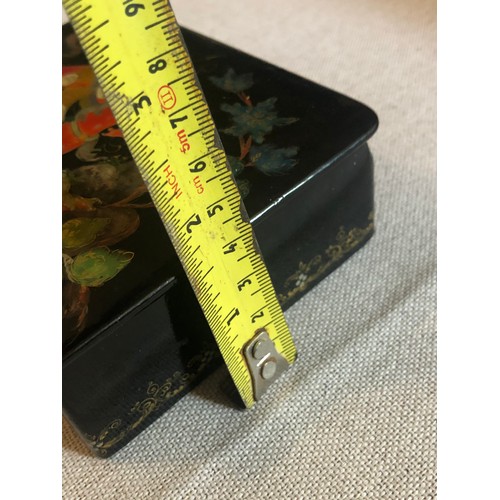 1414 - A beautiful Palekh Russian lacquered painted cigarette box with warrior riding a horse in full armou... 