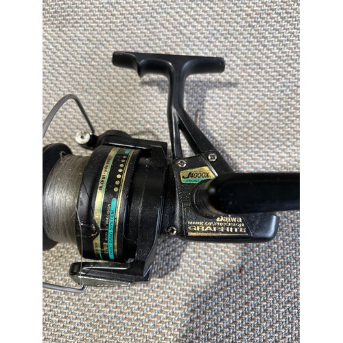 1555 - Diawa fixed spool J4000X graphite front drag system reel.