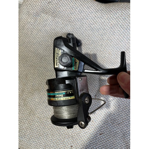 1555 - Diawa fixed spool J4000X graphite front drag system reel.