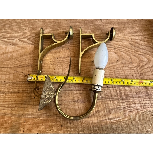 1587 - Pair of brass curtain pole supports and a brass wall light