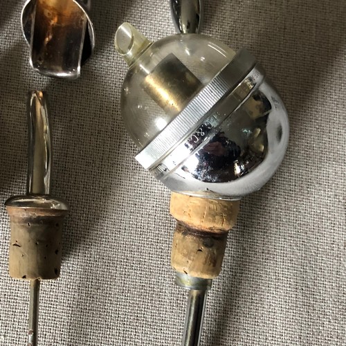1596 - Silver plated and chrome, Wine bottle spouts, measures and stoppers